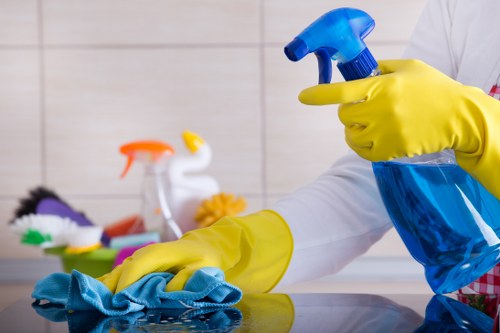 Employees using a tidy office kitchen