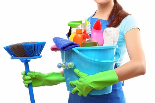 Clean kitchen cabinetry and surfaces after construction